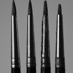 four brushes, new and used